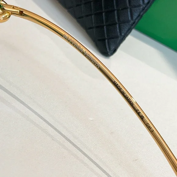 Bottega Veneta Emerald Sunglasses with Gold Details Bottega Veneta Emerald Sunglasses with Gold Details main image 3